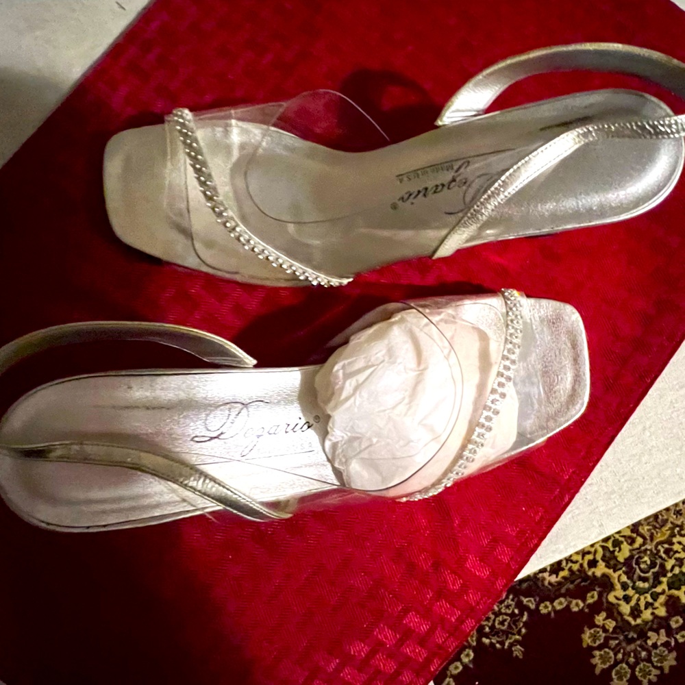 Clear heels with diamond strain maybe wore one time still in box